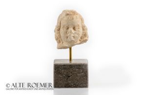 Hellenistic or Roman marble head of Eros