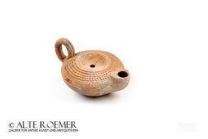 Roman oil lamp with dotted decoration
