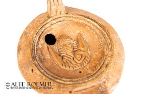 Roman oil lamp with personification of Africa