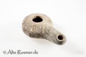 Hellenistische Öllampe mit S-förmigem Henkelansatz