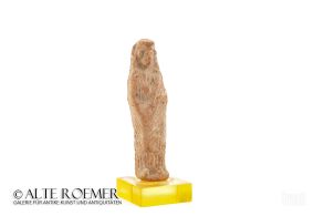 Greek clay figurine of a standing woman