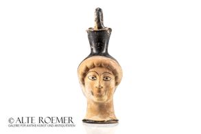 Athenian vase in the shape of a woman’s head