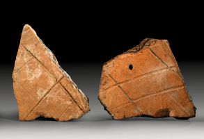 Two Roman tile fragments from the Rhineland