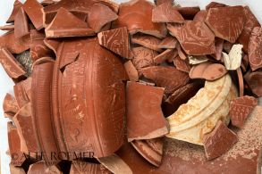 Roman potsherds from the Rhineland, including large relief decorated fragment with she-wolf or bear and birds