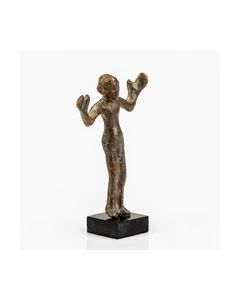 Published coptic bronze figurine of a praying man