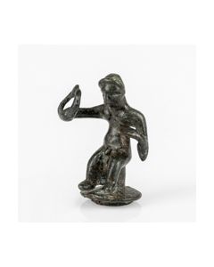 Published coptic bronze figurine of a sitting man