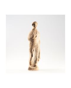 Große hellenistische Terrakottastatuette eines Manteljünglings