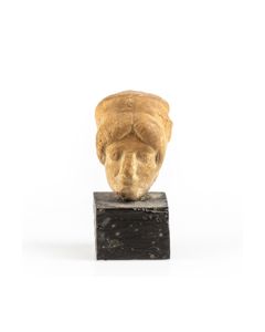 Clay head of a woman, possibly Kybele